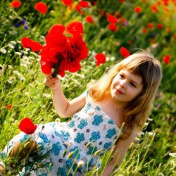 Child's Love - Cute Girl Holding A Flower