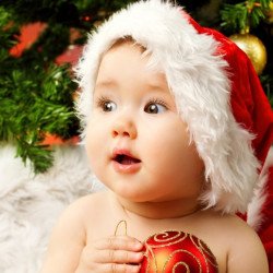 Child's Love -Christmas Baby Holding Red Ball Child's Love -Christmas Baby Holding Red Ball