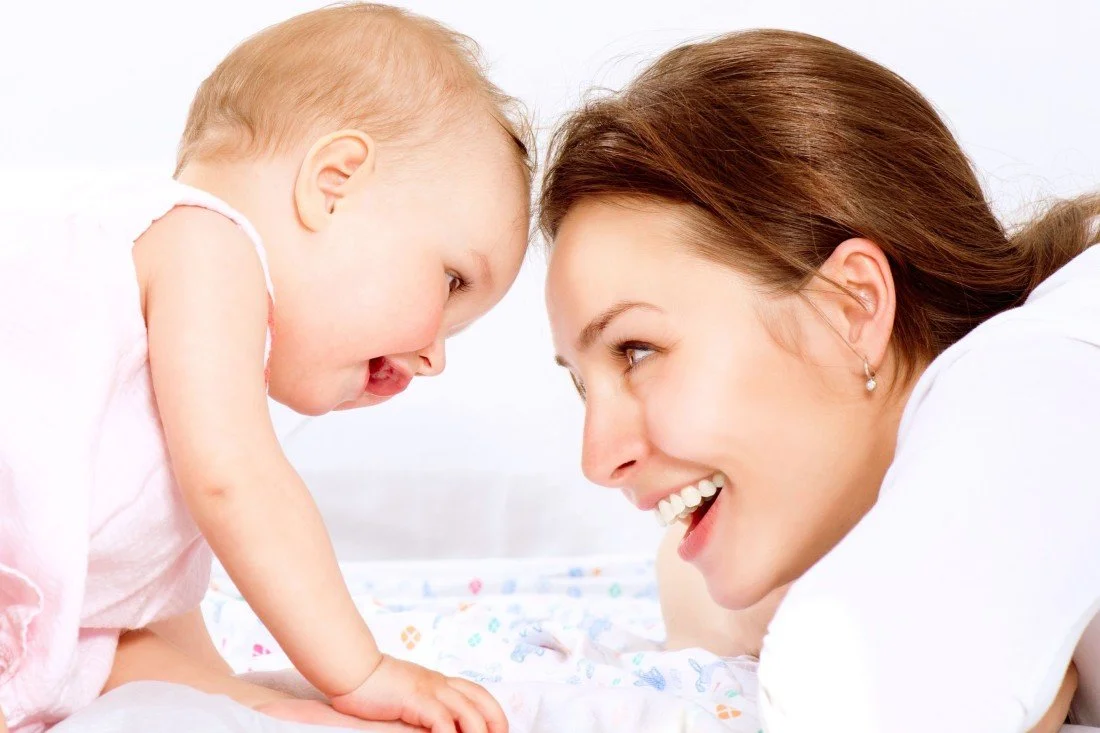 Child's Love - Cute Baby Smiling With His Mother