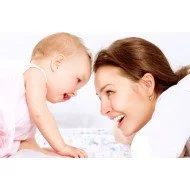 Child's Love - Cute Baby Smiling With His Mother