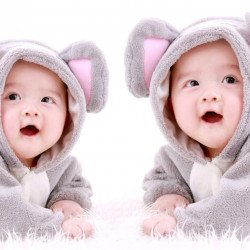 Child's Love - Cute Twins In Rabbit Dress Child's Love - Cute Twins In Rabbit Dress