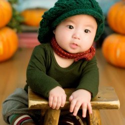 Child's Love - Cute Baby In A Green Outfit Child's Love - Cute Baby In A Green Outfit