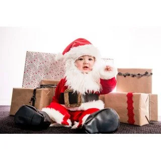 Download Cute Santa Claus With Christmas Gifts Wallpaper | Wallpapers.com