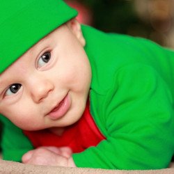 Child's Love - Cute Little Baby In A Green Get-Up Child's Love - Cute Little Baby In A Green Get-Up