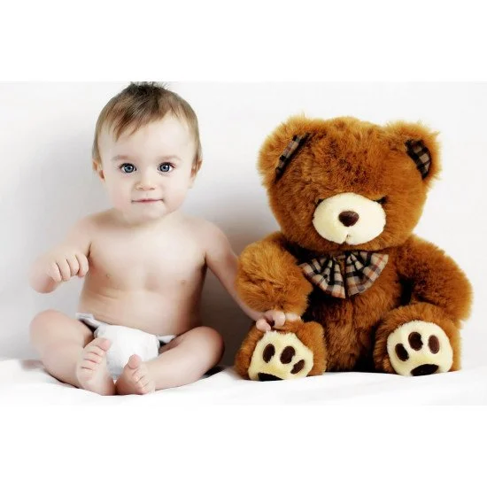 Cute Baby With Teddy