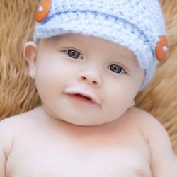 Child's Love - Smiling Baby In A Blue Hat Child's Love - Smiling Baby In A Blue Hat