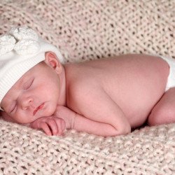 Child's Love - Sleeping Baby On A Wollen Couch Child's Love - Sleeping Baby On A Wollen Couch