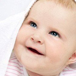 Child's Love - Smiling Baby In White Towel Child's Love - Smiling Baby In White Towel