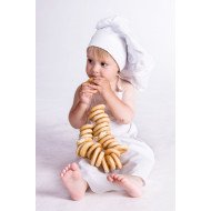 Child's Love - Chef Girl Eating Doughnut Child's Love - Chef Girl Eating Doughnut