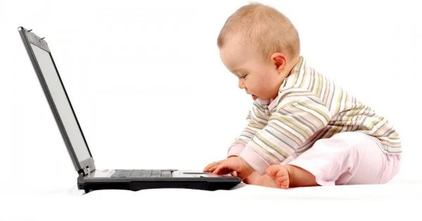 Child's Love - Baby With Laptop