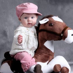 Child's Love - Cute Baby On Toy Horse Child's Love - Cute Baby On Toy Horse