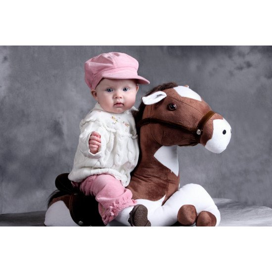 Child's Love - Cute Baby On Toy Horse