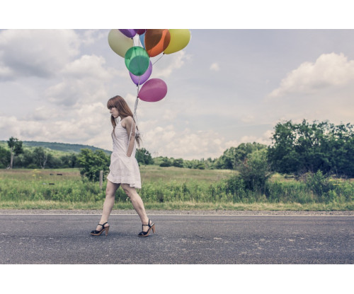 Lady On The Road With Balloons